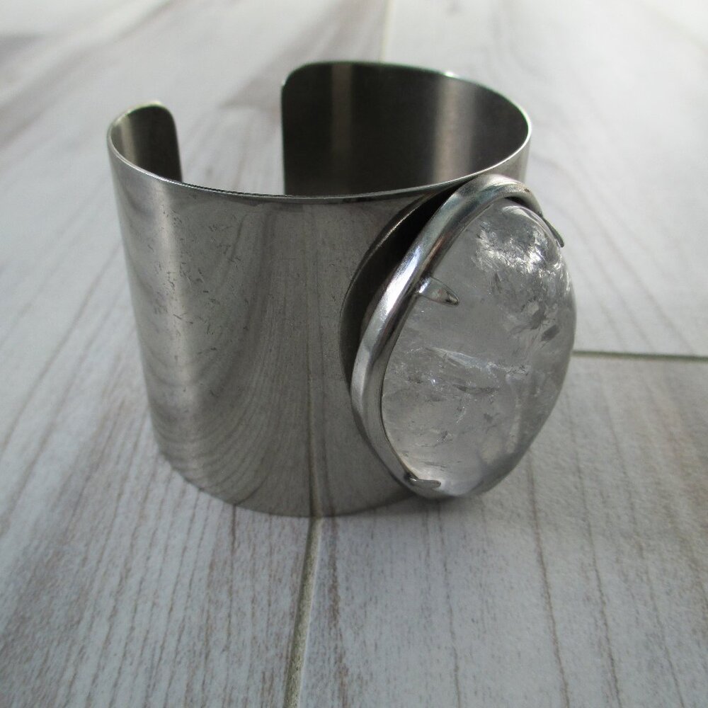 Metal cuff bracelet with large crystal
